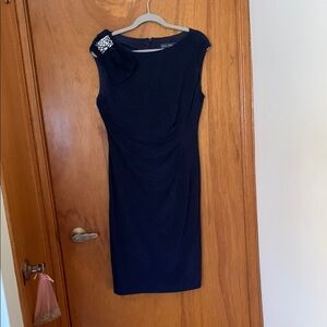 Elegant Black Dress with Embellished Shoulder